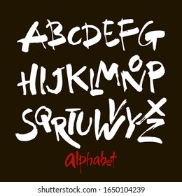 Vector Acrylic Brush Style Hand Drawn Alphabet Font. Calligraphy alphabet on a black background. Ink hand lettering.