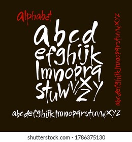 Vector Acrylic Brush Style Hand Drawn Alphabet Font. Calligraphy alphabet on a black background. Ink hand lettering.