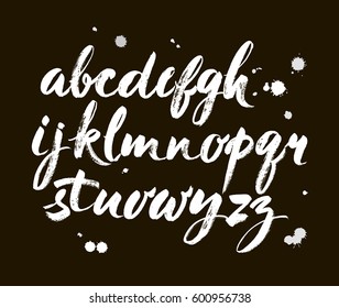 Vector Acrylic Brush Style Hand Drawn Alphabet Font. Calligraphy alphabet on a black background. ABC for your design, brush lettering