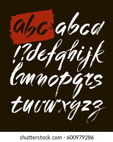 Vector Acrylic Brush Style Hand Drawn Alphabet Font. Calligraphy alphabet on a black background. ABC for your design, brush lettering