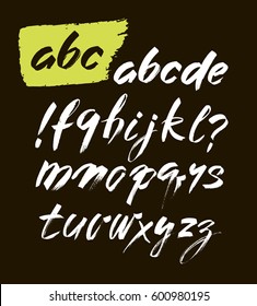 Vector Acrylic Brush Style Hand Drawn Alphabet Font. Calligraphy alphabet on a black background. ABC for your design, brush lettering