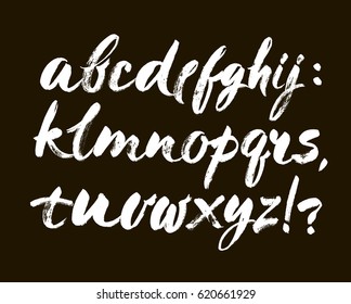 Vector Acrylic Brush Style Hand Drawn Alphabet Font. Calligraphy alphabet on a black background. ABC for your design, brush lettering