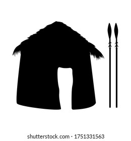 Vector of African village icons. A silhouette of an African house with a thatched roof isolated on a white background. Mud hut and African hunting spear tool icons.