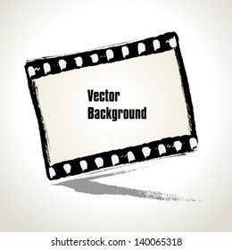 Vector: Aged  illustration of a grunge filmstrip frame with space for your text or image