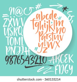 Vector alphabet. Hand drawn letters, numbers and decorative elements. Letters of the alphabet written with a brush
