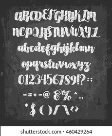 Vector alphabet. Hand drawn letters and numbers on chalkboard.