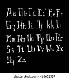 Vector alphabet. Hand drawn letters on black background. Letters of the alphabet written with a pen brush.
