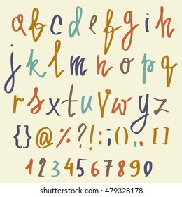 Vector alphabet. Hand drawn letters isolated on a pastel background. Letters of the alphabet written with a brush. 