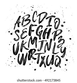 Vector alphabet. Hand drawn letters. Letters of the alphabet written with a brush. Black letters on a white background. Brush painted letters.