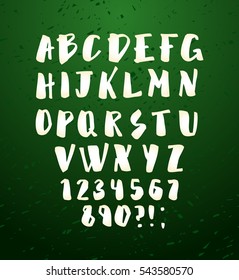Vector alphabet. Hand drawn letters. Letters of the alphabet written with brush. Calligraphy white letters on green chalkboard background. Vector illustration stock vector.