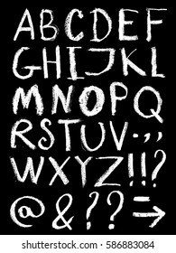 Vector alphabet. Hand drawn letters. Letters of the alphabet written with a white crayon on the blackboard. Use for blackboard menu.