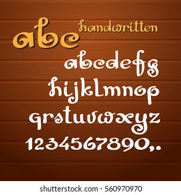 Vector  alphabet. Letters and numbers on  wooden background. Hand drawn cursive letters. Lowercase.