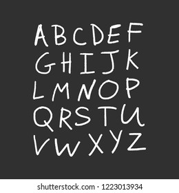 Vector alphabet letters, white chalk written on dark blackboard. Editable elements set.