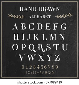 Vector alphabet and numbers set. Handwriting white letters and signs in vintage chalk style on black background.  Font was inspired from vintage Early 1900's tattoo's