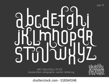 Vector alphabet set. Lowercase letters with decorative flourishes in the Art Nouveau style. White letters on black background.