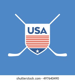 A vector American hockey crest on a blue background. The flat style crest features a star, stripes and crossed hockey sticks.