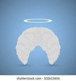 Vector angel wings on blue background. Eps10