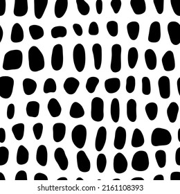 Vector animal skin pattern. Monochrome seamless pattern with reptile or crocodile skin texture. Black and white repeat background with cells, pebble stone mosaic, etc.