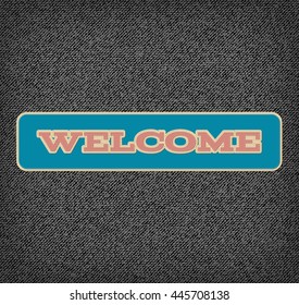 Vector applique style typographic banner on rough denim background. Layered, double stitched. Welcome