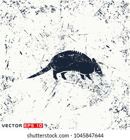 vector armadillo silhouette on grunge background
