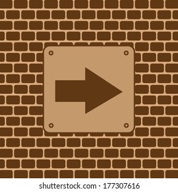 Vector arrow symbol on brick wall 