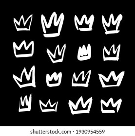 Vector art illustration grunge crown. Set of hand drawn paint object for design. Black and white Graffiti background. Abstract brush drawing