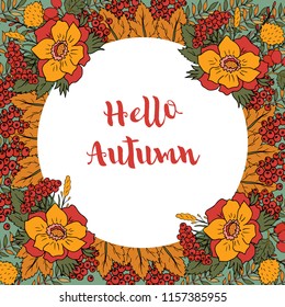 Vector autumn background frame with wreath colorful leaves, flowers and berries and hand written text "Hello autumn".