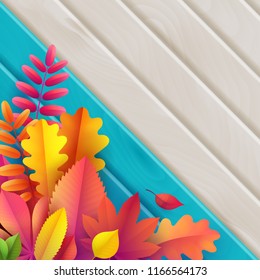 Vector autumn banner. Bouquet of bright yellow, orange, red fallen autumn leaves on turquoise background with wooden texture. Greeting, gift, discount promotion and party banners and cards template.  