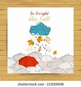 Vector autumn doodles card. Hand draw umbrellas and leafs over watercolor paper. Lettering quote. Season of the rain, greeting card, cute background. Color doodle background. Vintage style.