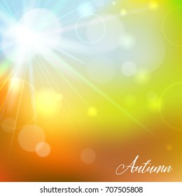 Vector autumn illustration of soft colored abstract background with bokeh and text