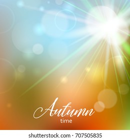 Vector autumn illustration of soft colored abstract background with bokeh and text