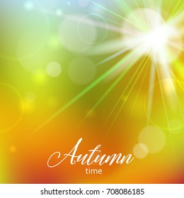 Vector autumn illustration of soft colored abstract background with bokeh and text