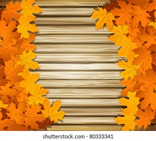 Vector autumn leaves on the background of a wooden wall