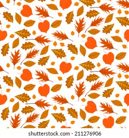 Vector autumn seamless background with pattern of various leaves and branches in organic natural colors - orange, green, brown, yellow gold. Floral print for summer fall fashion