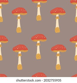 Vector autumn seamless pattern with amanita. Repeated texture with natural elements for fall season. Forest background. For scrapbooking, fabric, wrapping paper, notebook covers.