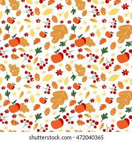 Vector autumn seamless pattern with leaves, berries and acorns