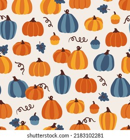 Vector autumn seamless pattern with pumpkins. Repeated texture with natural elements for fall season. Hand drawn print for fabric and wrapping paper. Pumpkin patch. Harvest festival