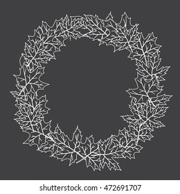 Vector autumn wreath made of silhouettes of leaves on the blackboard with space for text. Template for cards, invitations. Design element.