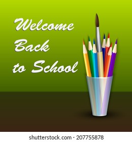 Vector back to school supplies as color pencils and paint brush in the caddy