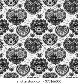Vector background with  beautiful  hearts. Seamless pattern with ornate floral lace hearts. Black white illustration. Valentine day lacy backdrop.