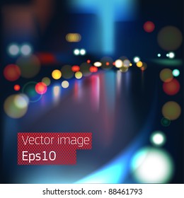 Vector background. Blurred Defocused Lights of Heavy Traffic on a Wet Rainy