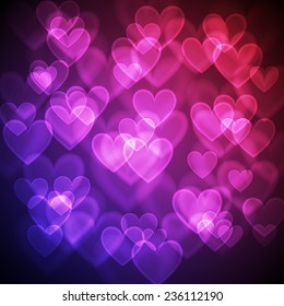 Vector background of bright pink bokeh hearts