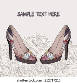 Vector background with an elegant pair of women's shoes