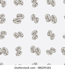 Vector background with hand drawn natural coffee beans. Seamless coffee beans pattern. Vintage coffee design for shop or cafe