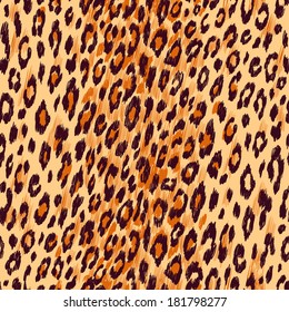 Vector background of leopard skin. Seamless pattern.