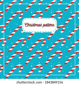 Vector background for new year and Christmas. Candy canes on a mint background.