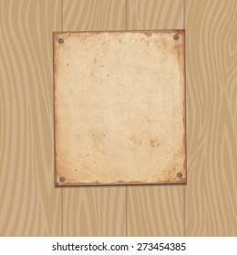 Vector background. Old paper on wooden planks