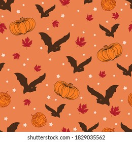 Vector background with seamless pattern of bats for Halloween with pumpkins