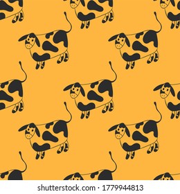 Vector background, seamless pattern. Cute cow on a yellow background.