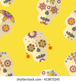 Vector background (seamless pattern) with skulls with floral ornament and buttercup yellow background. Can be used as wrapping paper on Halloween, web page background, textile print etc.